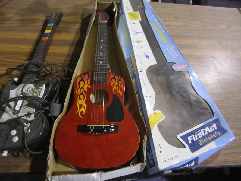 lot 195 image: Guitar hero guitar and first act di...