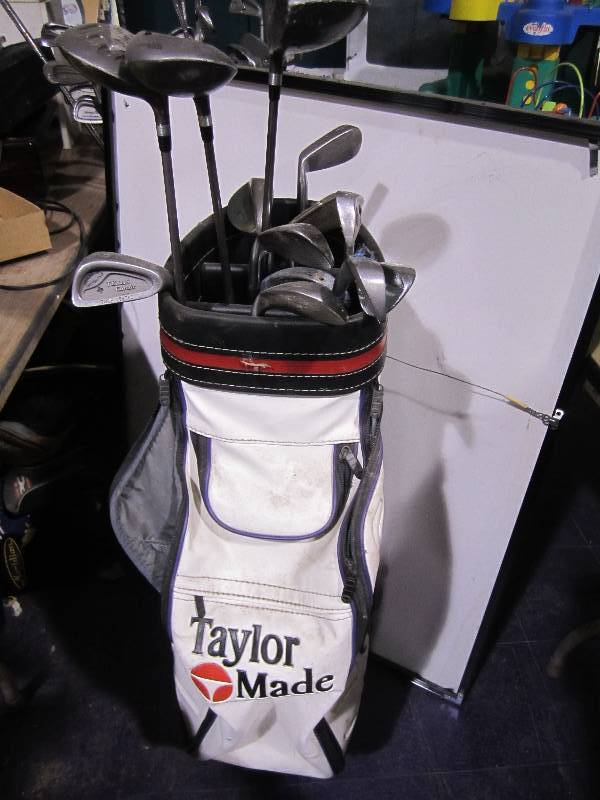 lot 201 image: Taylor Made golf bag with clubs...