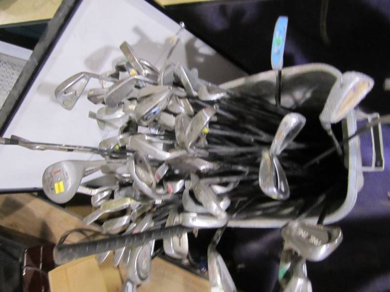 lot 202 image: Large lot of putters and golf clubs...