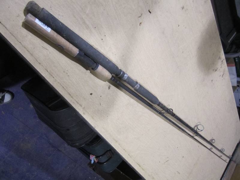 lot 210 image: 2 fishing rods, and a rod holder, o...