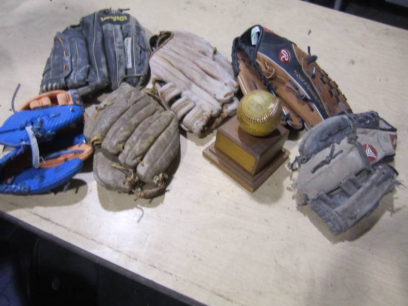 lot 215 image: Lot of baseball gloves and an autog...