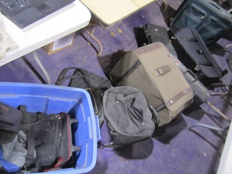 lot 218 image: Lot of bags and suit cases...