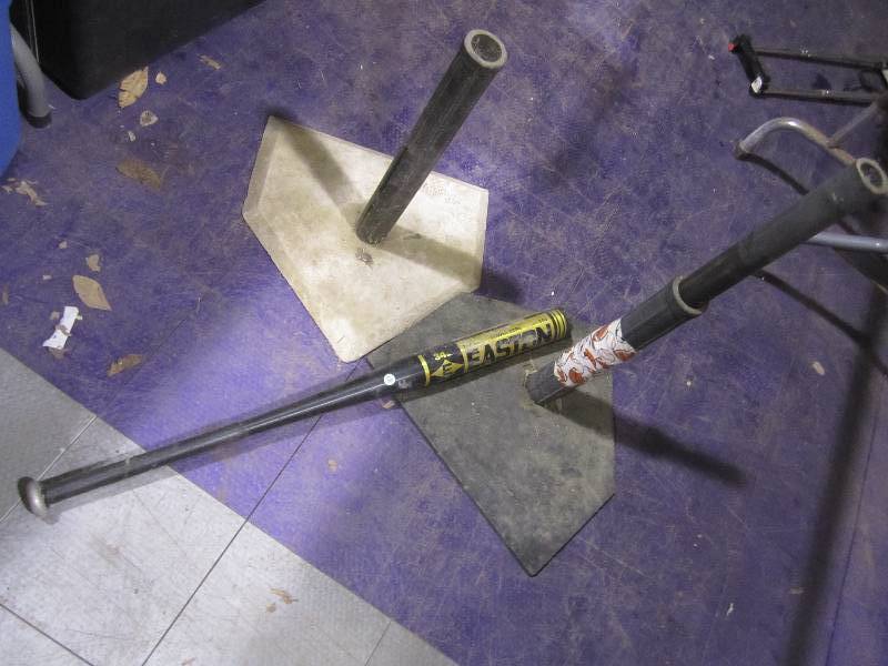 lot 228 image: Baseball bat and two Tees...