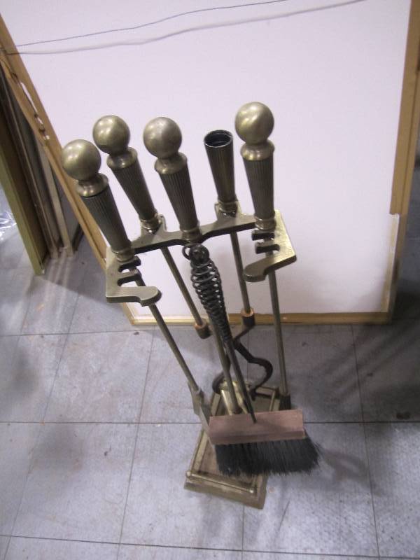 lot 232 image: Fireplace tools in a stand...
