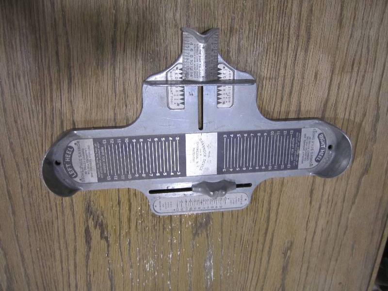lot 242 image: Shoe size measuring tool...