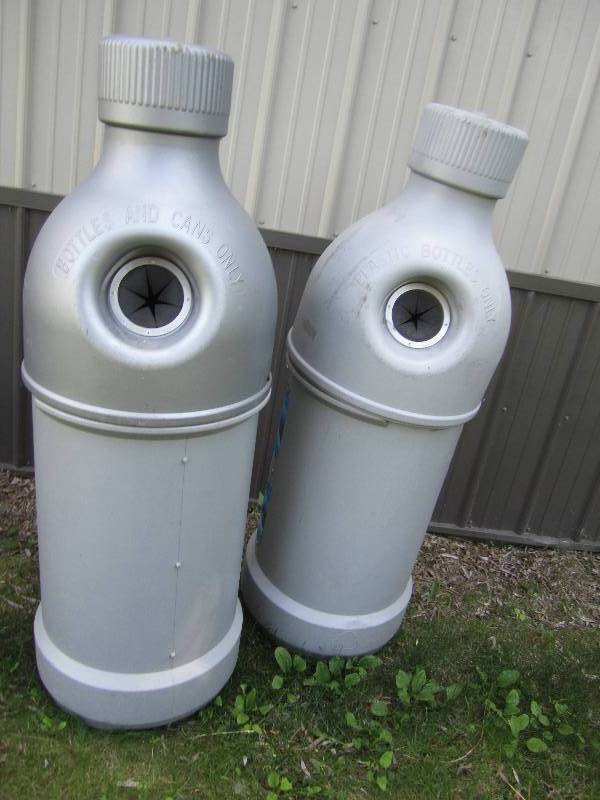 lot 320 image: Bottle shaped recycling containers