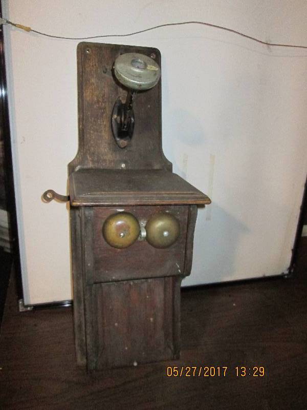 lot 27 image: Antique telephone...
