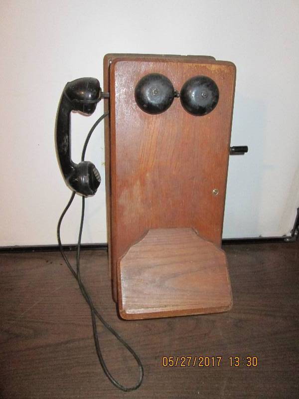 lot 28 image: Antique telephone...