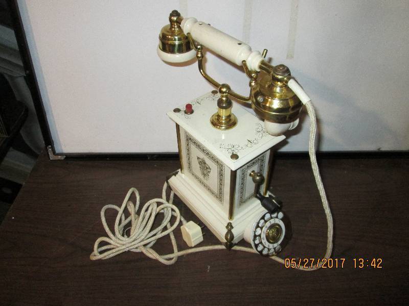 lot 34 image: Vintage fancy telephone...