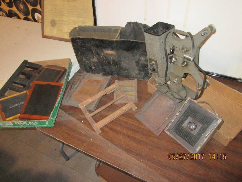 lot 44 image: 8 MM Projector and frames...