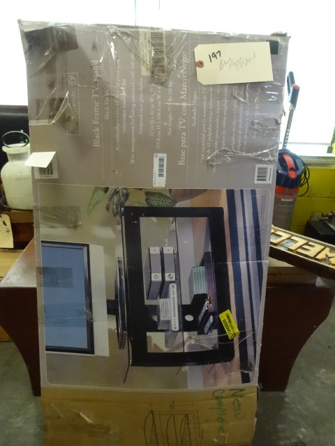 lot 197 image: Black Frame TV Stand by Hometrends,...