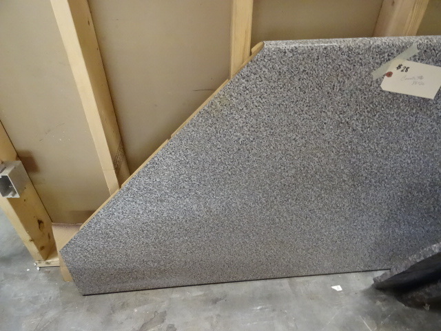 lot 28 image: Countertop w backsplash, angled ed...