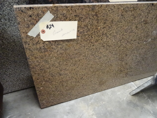 lot 24 image: Granite piece, roughly 20 x 36 x 1 ...