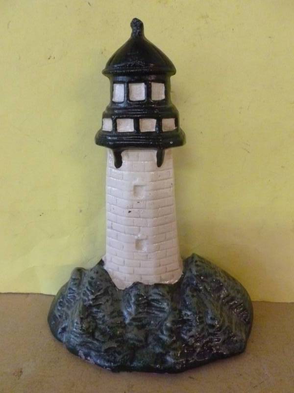 lot 99 image: Cast Iron Door Stop