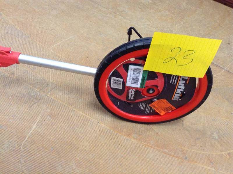 lot 23 image: Lufkin Wheel Large couple dents on handle