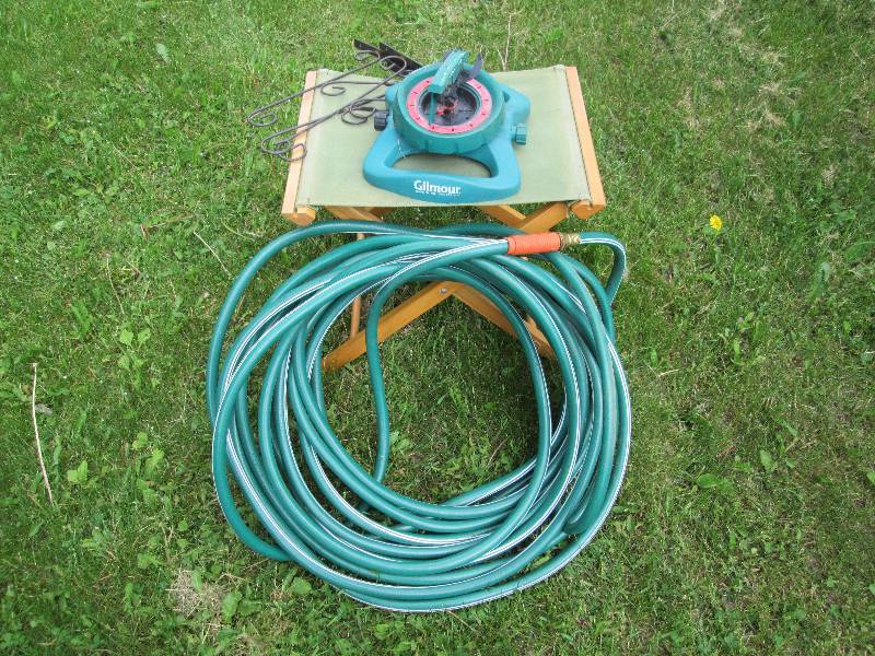 lot 181 image: Garden Hose & Sprinkler