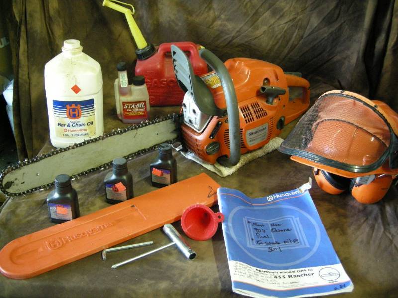 lot 1 image: Husqvarna 455 Rancher Chainsaw Group
