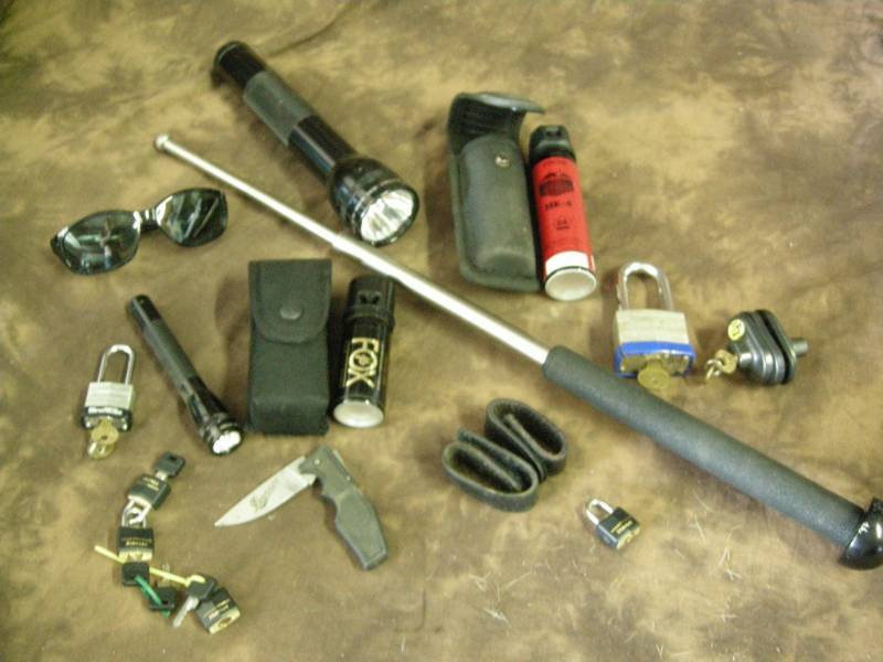 lot 128 image: Baton, Mace, Knives, Locks
