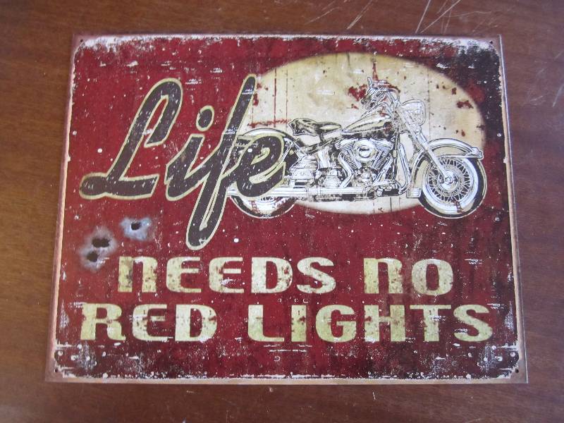 lot 14 image: Metal motorcycle sign...