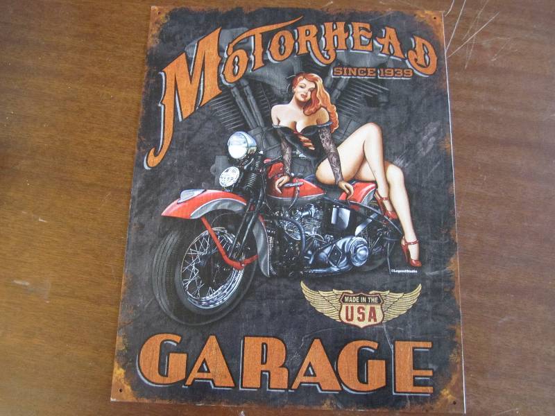 lot 19 image: Metal garage sign...