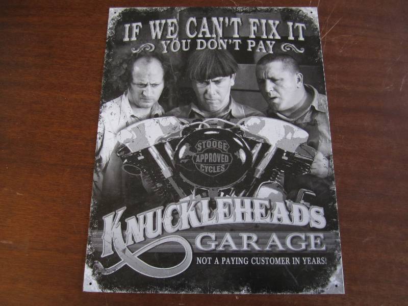 lot 21 image: Metal garage sign...