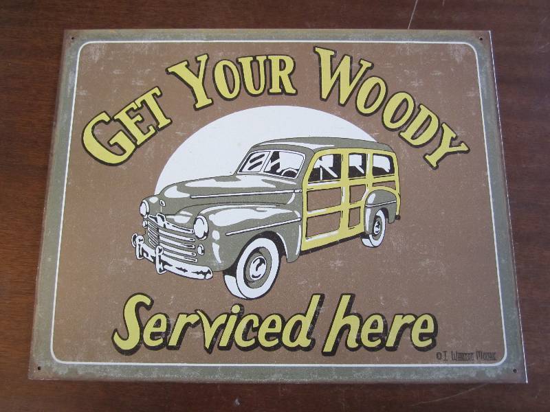 lot 22 image: Metal garage sign...