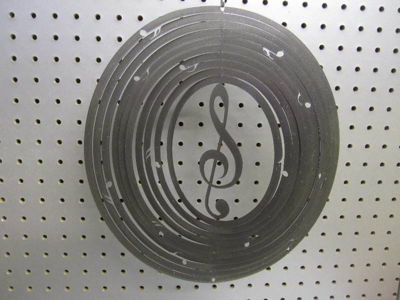lot 28 image: Iron Stop metal wind spinner...