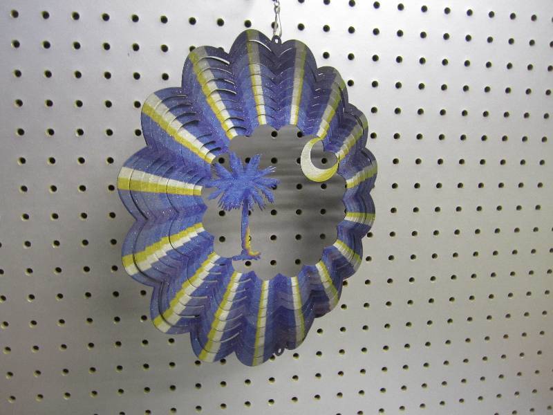 lot 29 image: Iron Stop metal wind spinner...