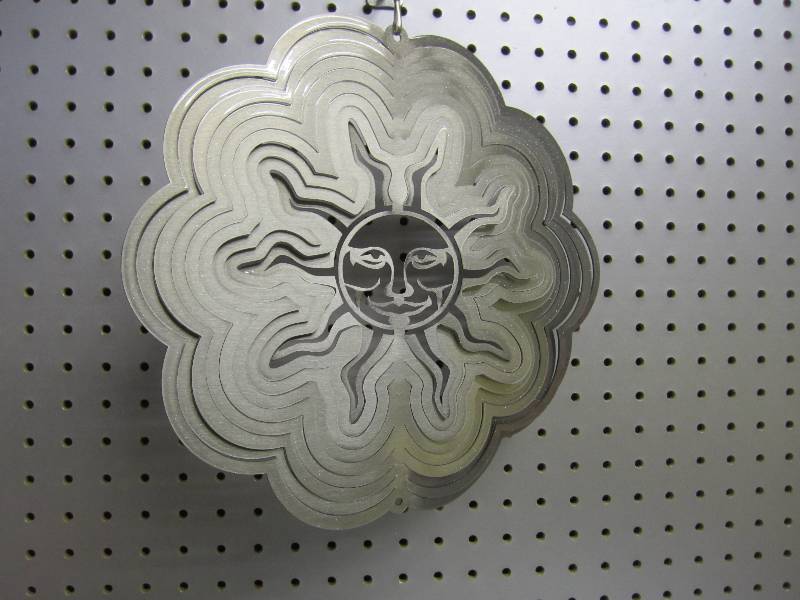 lot 30 image: Iron Stop metal wind spinner...