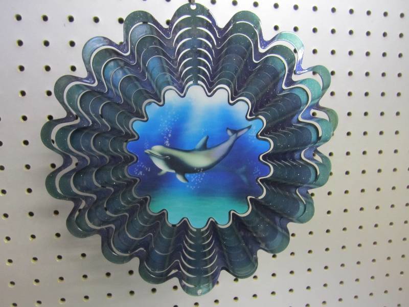lot 31 image: Iron Stop metal wind spinner...