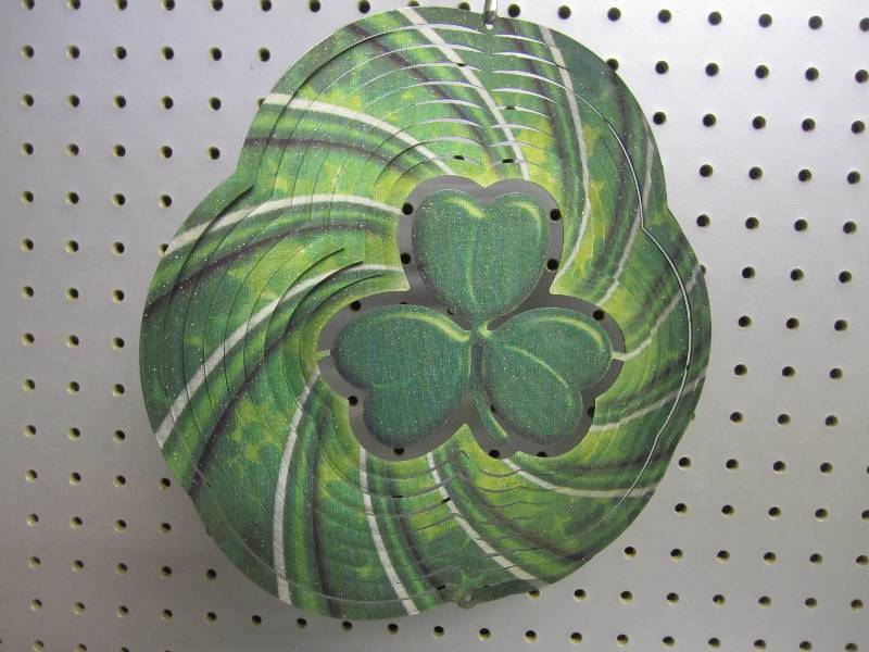 lot 32 image: Iron Stop metal wind spinner...