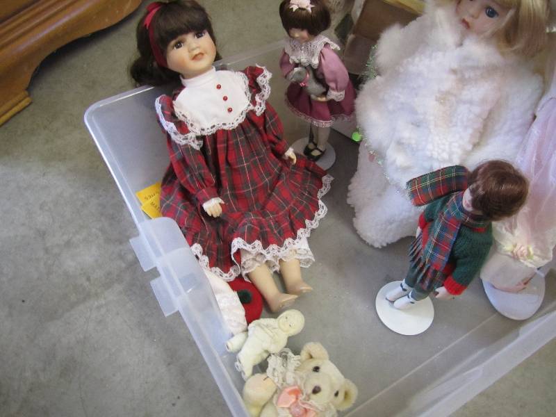 lot 87 image: Collector dolls with stands in plas...