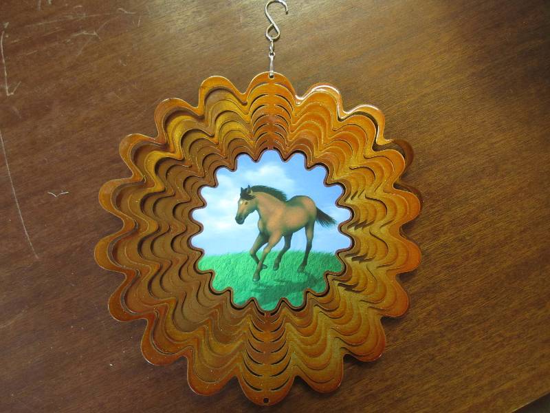 lot 91 image: Horse metal wind spinner 10.5...