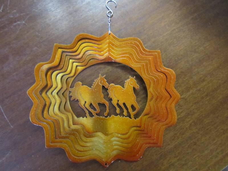 lot 95 image: Horses metal wind spinner 9.75x10.7...