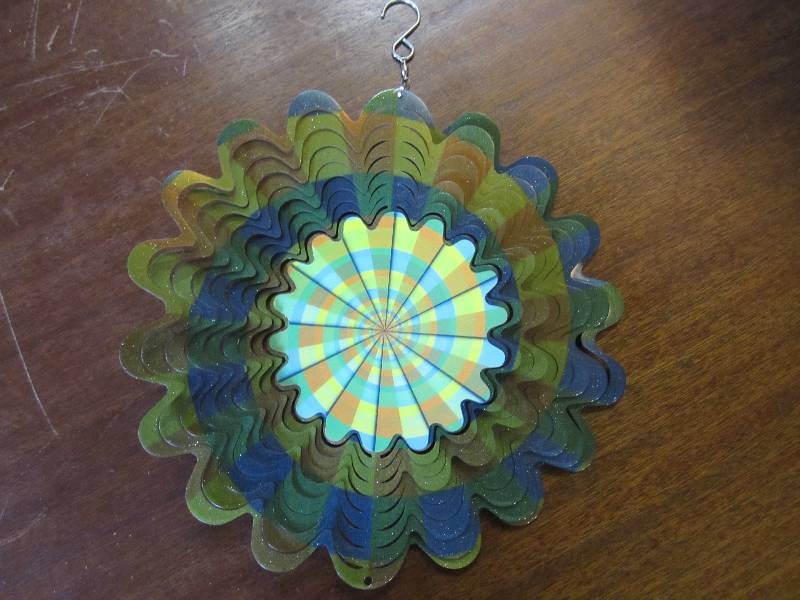 lot 97 image: Multi color spiral metal wind spinn...