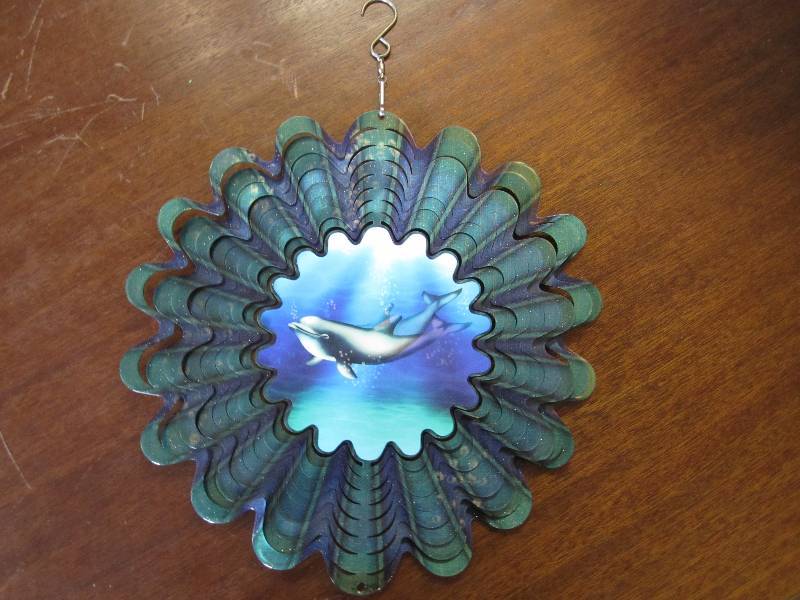 lot 98 image: Dolphin metal wind spinner 10.5...