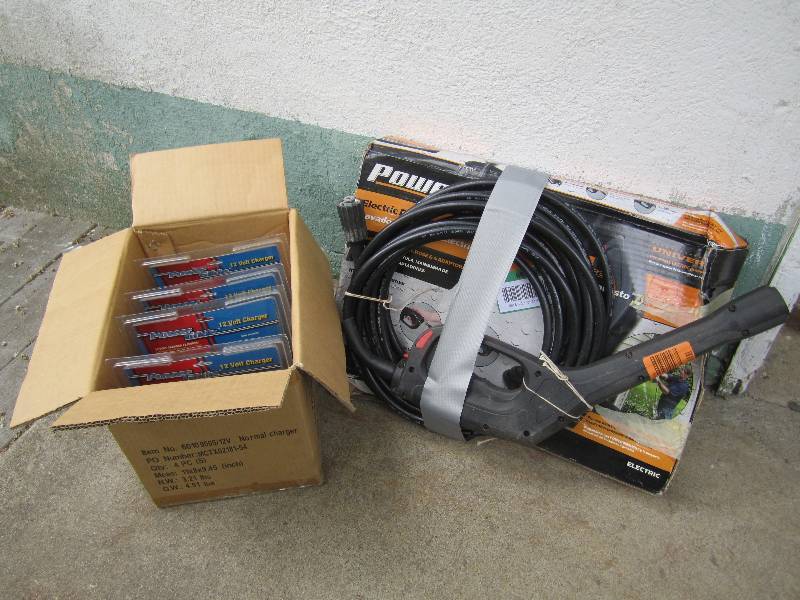lot 106 image: 4 12 volt chargers and electric pre...