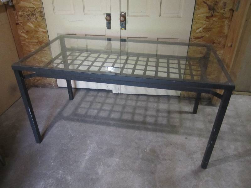 lot 173 image: Glass top table. Metal frame. 57.5x...