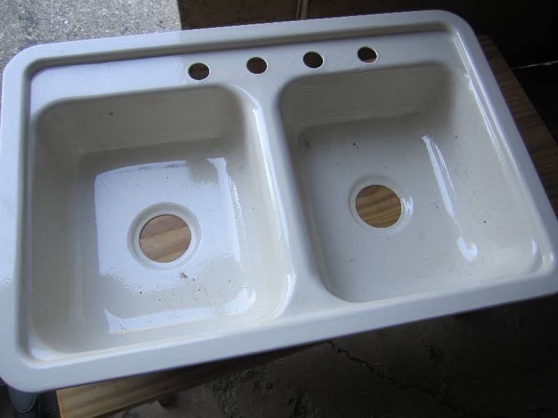 lot 255 image: Double kitchen sink. Looks to be in...