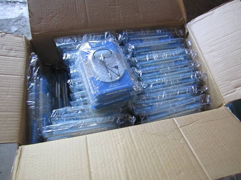 lot 262 image: Case of 100 hands free accessories....