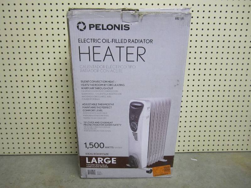 lot 269 image: Electric oil-filled radiator heater...
