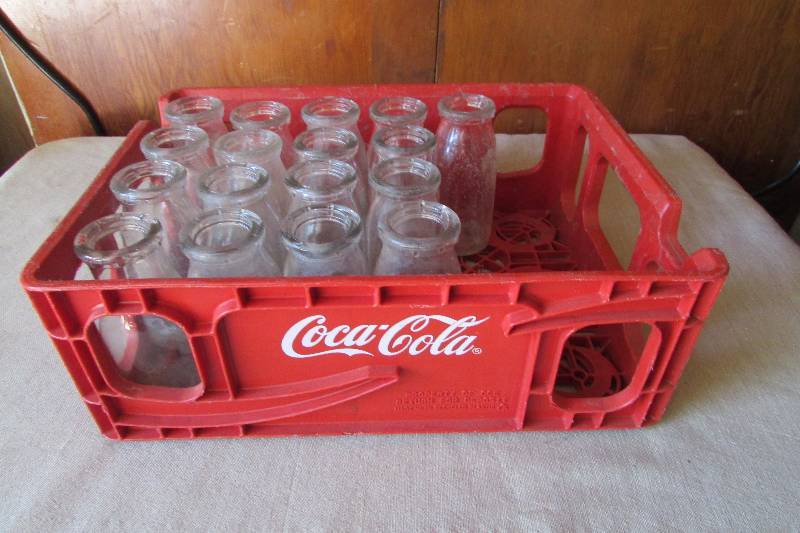 lot 6 image: Vintage Milk Bottles