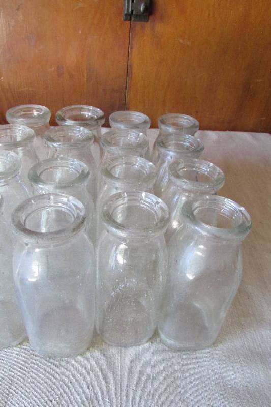 lot 7 image: Vintage Milk Bottles