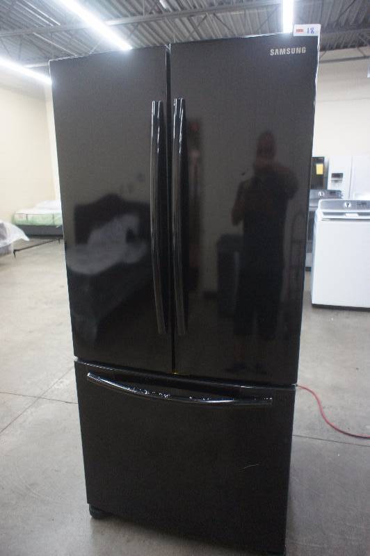 lot 18 image: USED - Samsung Model # - RF217ACBP - 20 cu. ft. French Door Refrigerator - Black Color - Scratch and Dent - Tested Works - Fridge does not make Ice - Water Tested Works - MSRP $ 2199.99