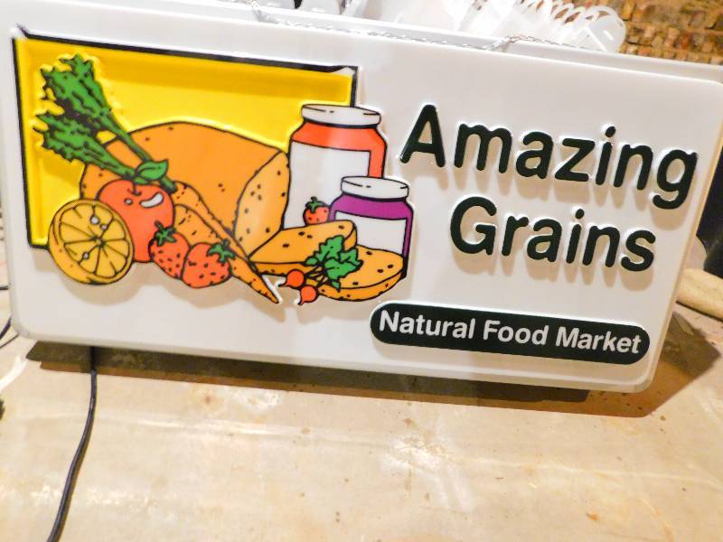 lot 195 image: AMAZING GRAINS LIGHTED SIGN