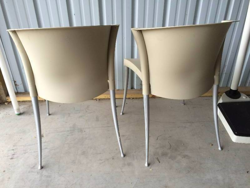 lot 13 image: Retails New $700 - Two High Quality Contempory Westinnielsen Azuza Guest Side Armless Plastic Stack Indoor Outdoor Chairs - Nice Condition Could use a little dusting off