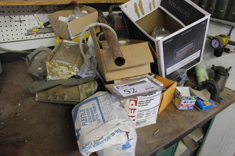 lot 52 image: Half Table Lot Includes Floor Patch, Lighting, Hardware, Milwaukee Radio