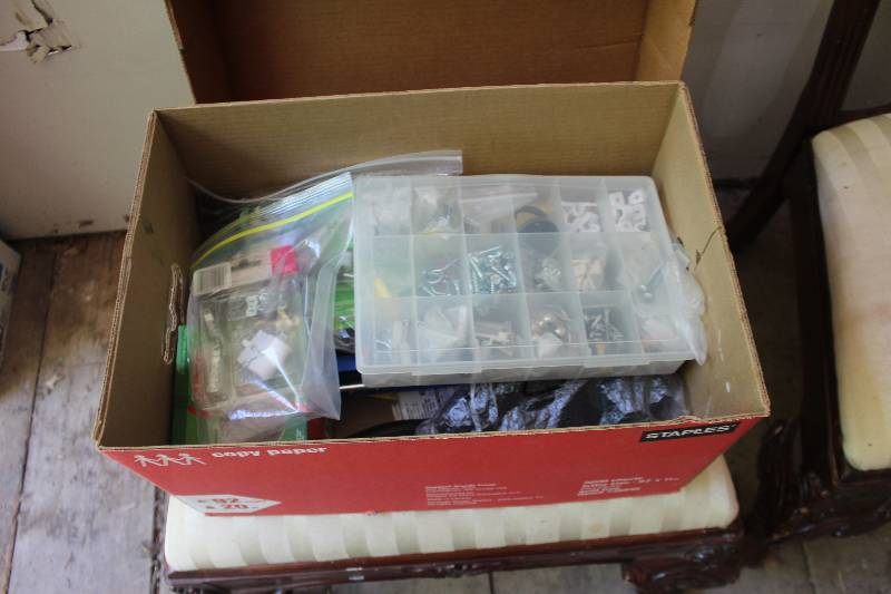 lot 183 image: Tools Includes Quick Pump, Picture Holder, 2-Plug Extension, Caulk Gun, Hardware, And More