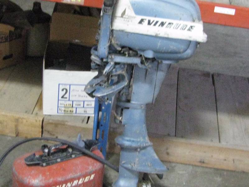 lot 27 image: Evenrude Motor & Gas Tank
