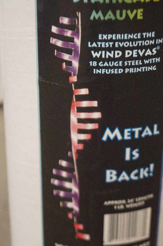 lot 17 image: Metal Spiral Wind Devas
